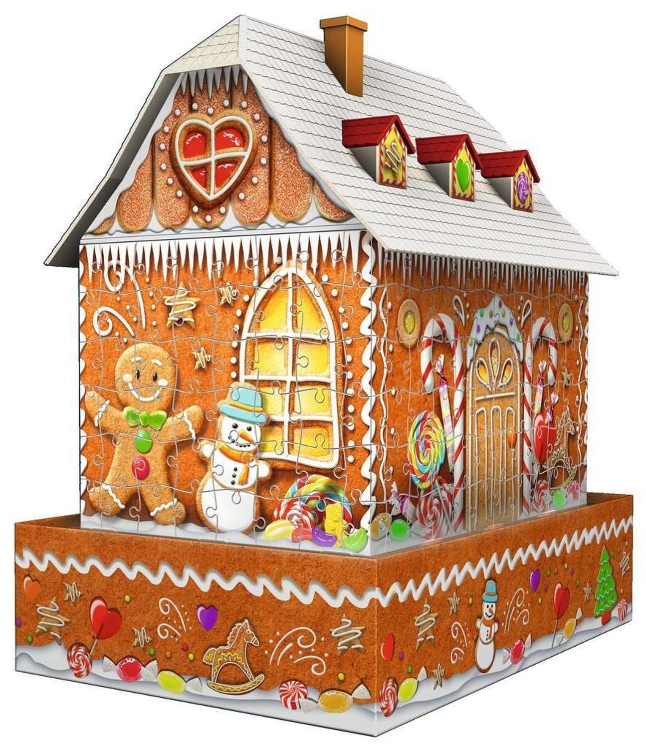 Fertig gebautes 3D-Puzzle Lebkuchenhaus bei Nacht. Lebkuchenmann, Schneemann und Süßigkeiten dekoriert.