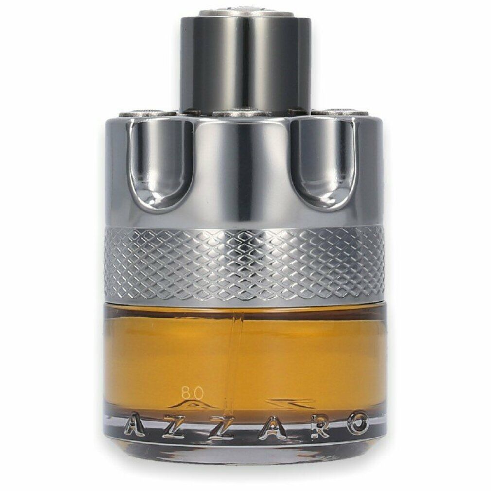 Azzaro Wanted by Night Eau de Parfum Flakon. Zylindrische Form, silberfarbener Verschluss, goldgelbe Flüssigkeit.