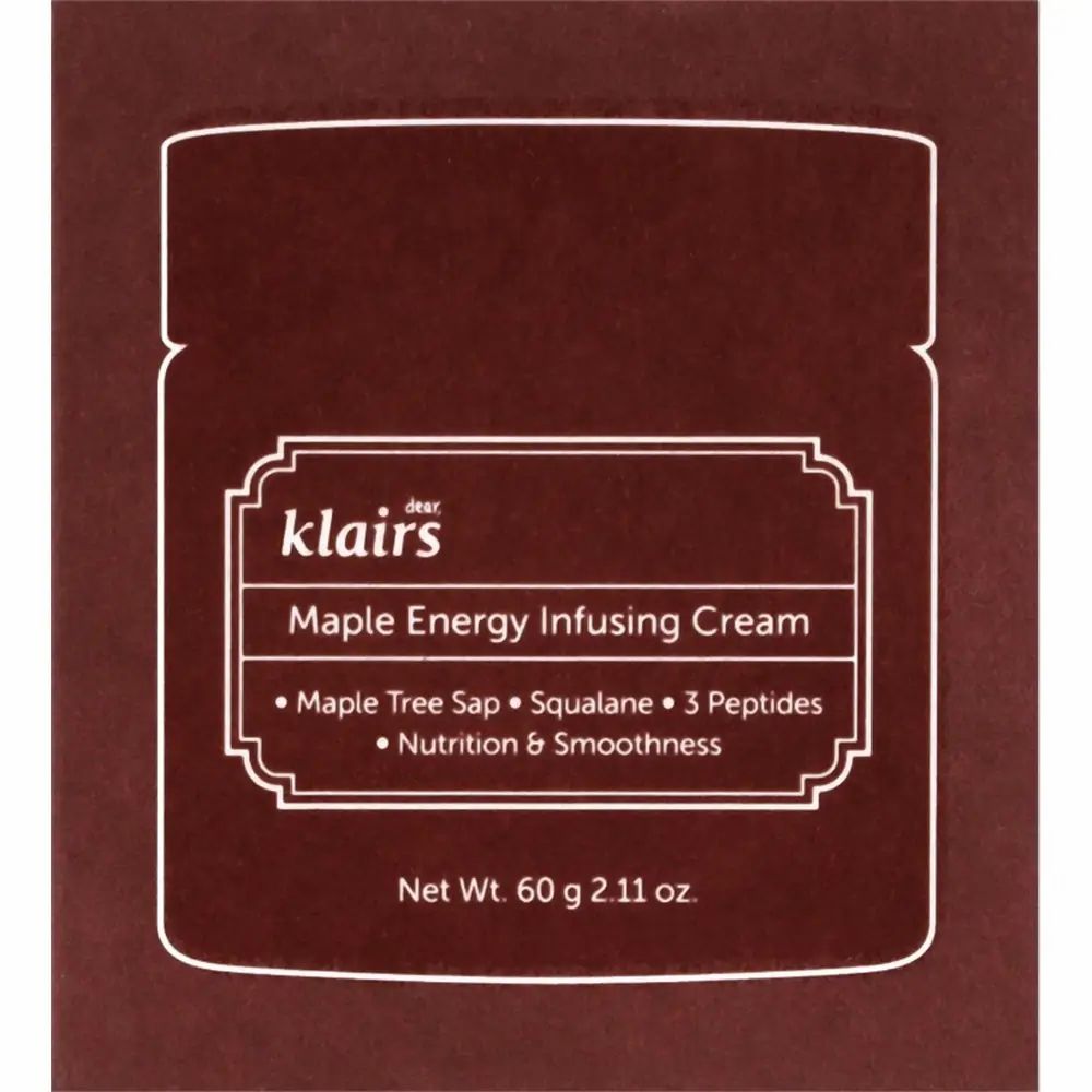 Braune Verpackung mit weißer Aufschrift. Aufschrift: Dear Klairs Maple Energy Infusing Cream. Enthält Ahorn, Squalan und Peptide.