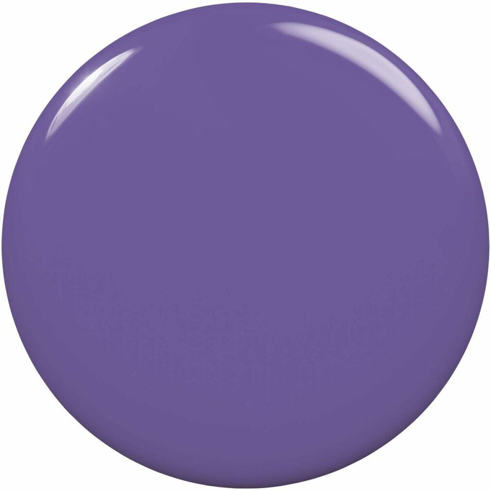Runder, glänzender, violetter Nagellack-Fleck. Die Oberfläche reflektiert das Licht.