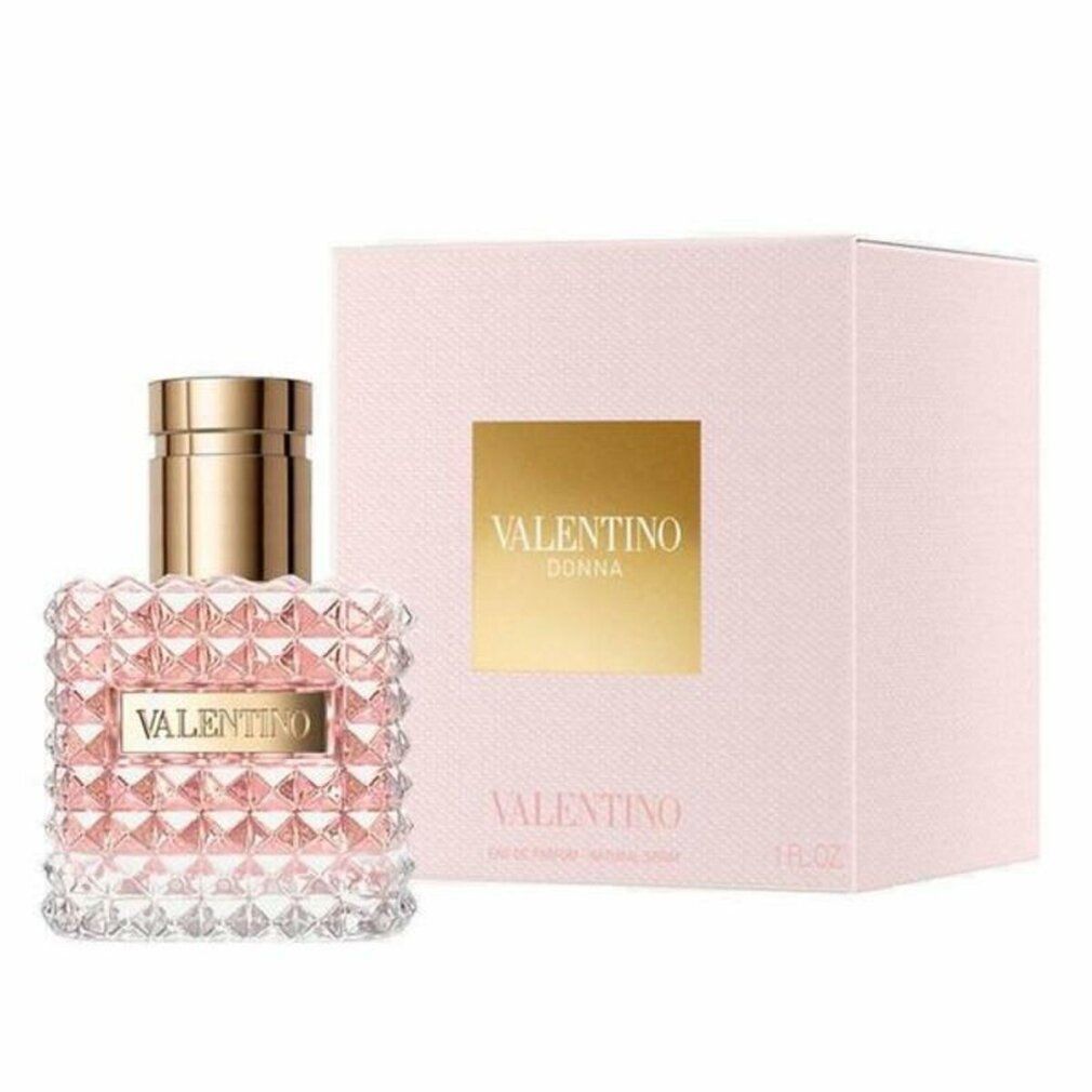 Flakon und Verpackung. Flakon quadratisch, goldfarbener Verschluss, Aufschrift VALENTINO. Rosa Flüssigkeit. Rosa Verpackung mit Logo.