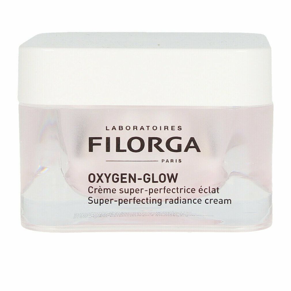 Filorga Oxygen-Glow Creme. Weißer Deckel, transparente Dose. Schriftzug: FILORGA, OXYGEN-GLOW, Crème super-perfectrice éclat.