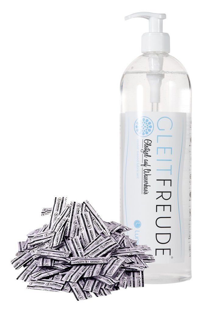 Eine Flasche Gleitgel mit Pumpe und ein Haufen Kondome. Auf der Flasche steht "Gleitfreude".
