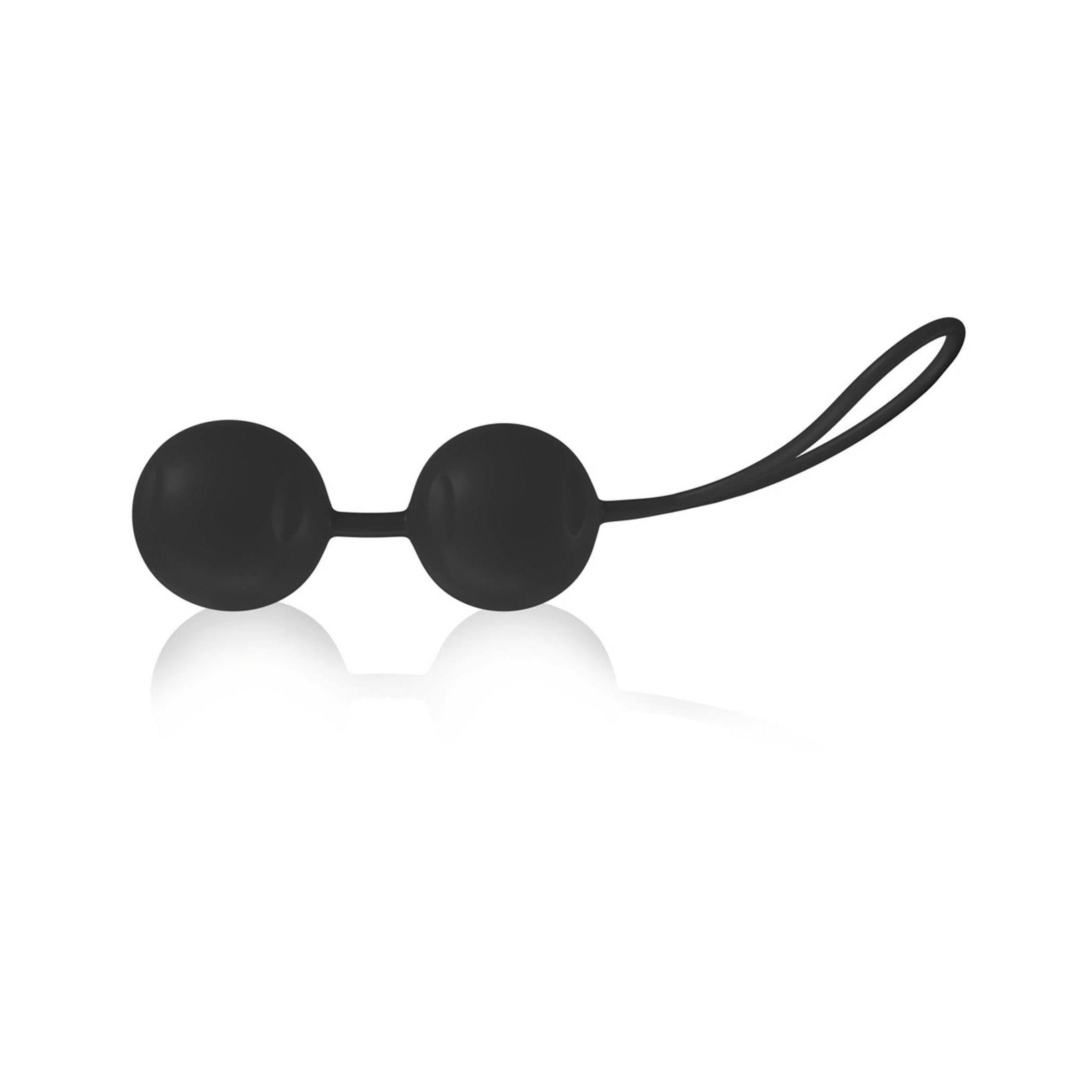 Schwarze Joyballs® Trend, zwei Kugeln mit Verbindungsstück und Schlaufe. Produktansicht von oben, auf hellem Hintergrund.