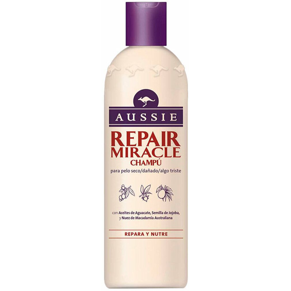 Beige Shampoo-Flasche mit lila Deckel. Aufschrift: Aussie Repair Miracle Champú. Enthält Avocado, Jojoba und Macadamia.