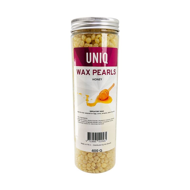 Zylindrische Dose mit Wachsperlen. Aufschrift: UNIQ WAX PEARLS HONEY. 400g. Honig-Motiv.