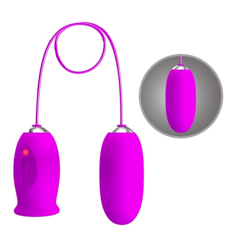 Zwei ovale, magenta-farbene Vibratoren, verbunden durch ein lila Kabel. Ein Vibrator hat Knöpfe und Lichter. Detailansicht.