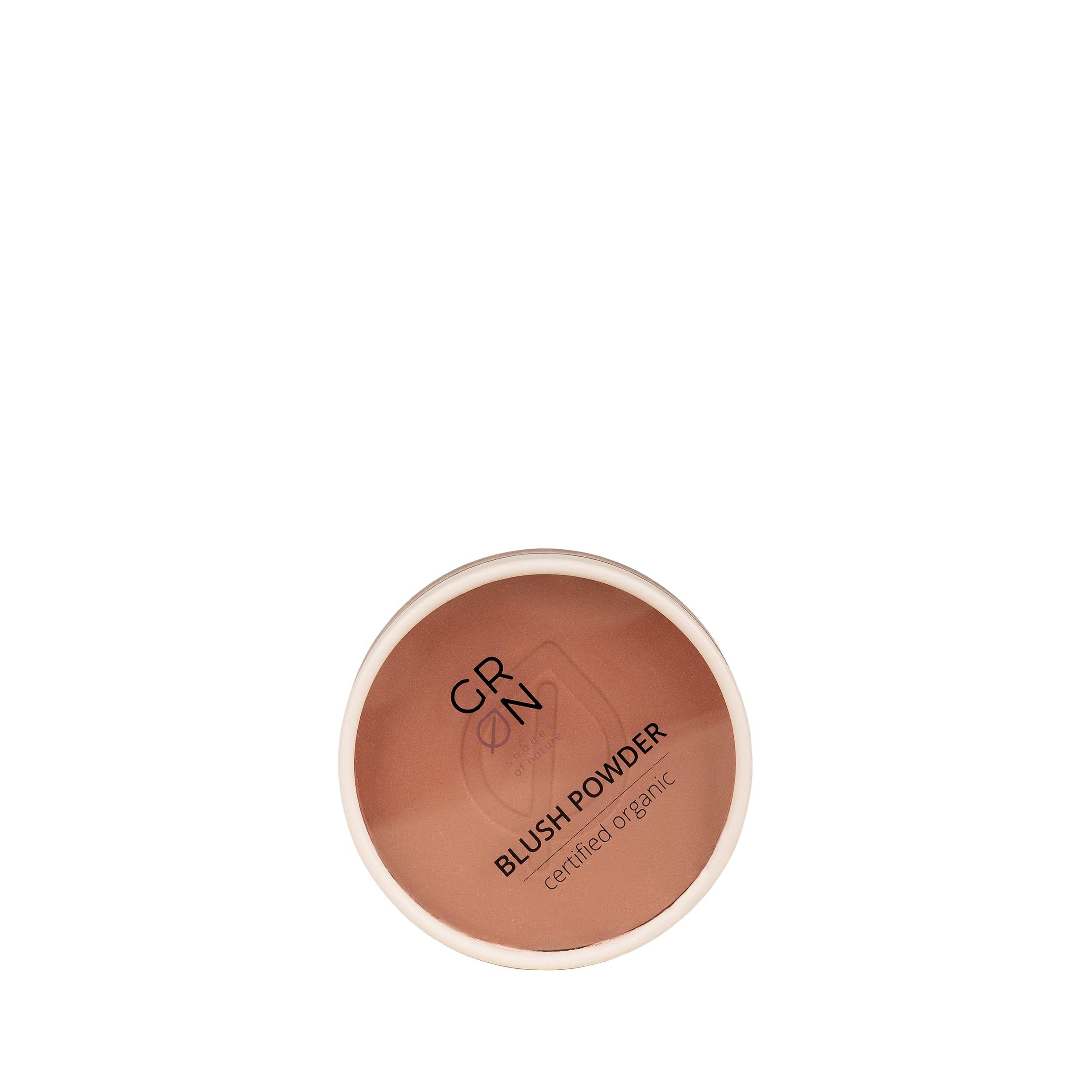 Runder Blush-Puder-Behälter mit coral reef Farbe. Aufschrift: GRN, Blush Powder, certified organic.
