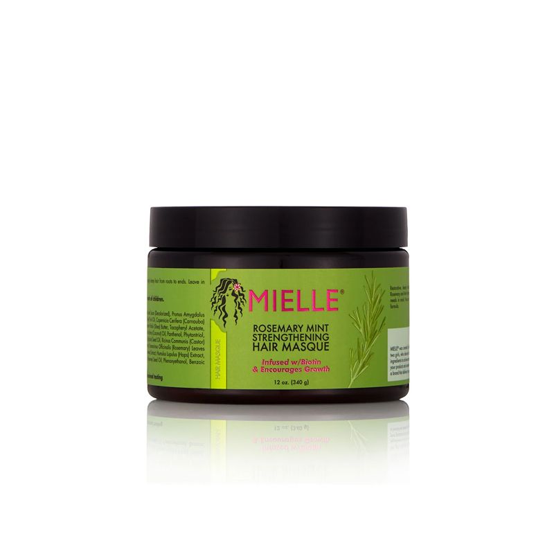 Mielle Rosemary Mint Strengthening Hair Masque in einem grünen Behälter mit schwarzem Deckel.