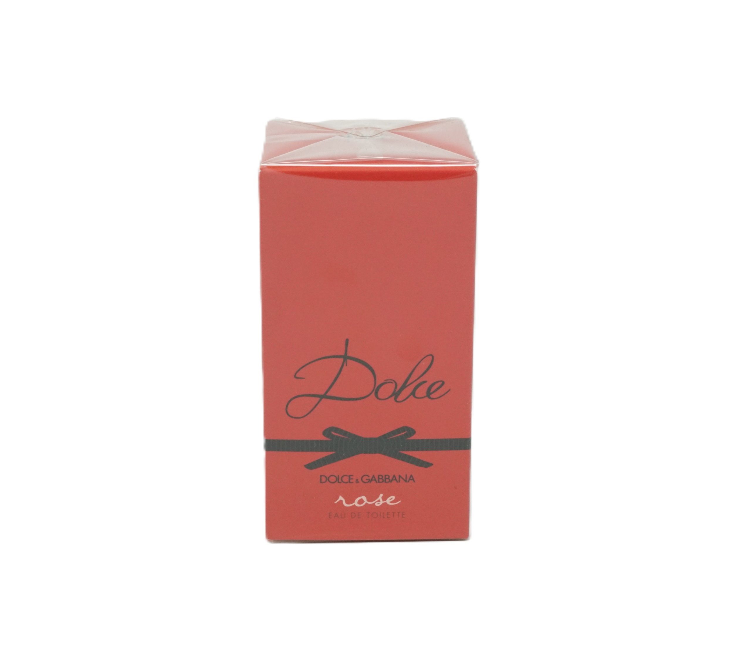 Rote rechteckige Verpackung. Oben transparent. Aufschrift "Dolce" mit Schleife. Darunter "Dolce & Gabbana rose Eau de Toilette".