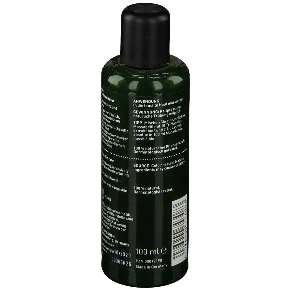 Grüne Flasche mit schwarzem Deckel. Etikett mit Text und 100 ml Angabe. Aufschrift: 100% natural, dermatologisch getestet.
