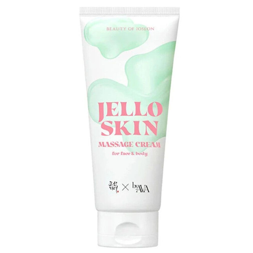 Weiße Tube mit "Jello Skin Massage Cream" Aufschrift, umgeben von grüner Creme.