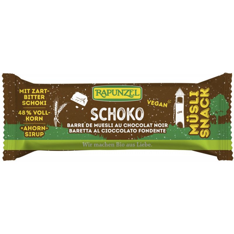 Verpackung eines Müsli-Riegels mit Schoko. Aufschrift: Rapunzel Schoko, vegan, Müsli Snack. Enthält 48% Vollkorn, Ahornsirup.