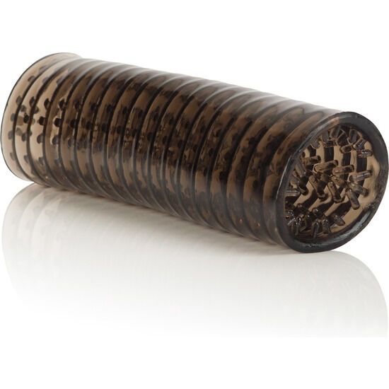 Zylindrisches Produkt mit Noppen. Dunkelbraun. Auf weißem Hintergrund.