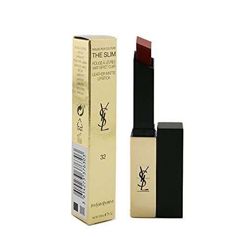 Goldfarbener Lippenstift mit schwarzem Deckel und Verpackung. Auf der Verpackung steht "Yves Saint Laurent The Slim".