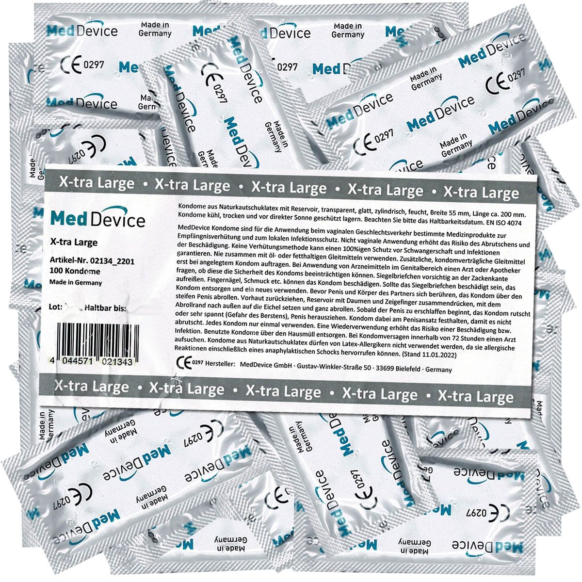 Emballage de préservatifs. Emballages individuels avec nom du produit et marquage CE. Texte : X-tra Large, Med Device.