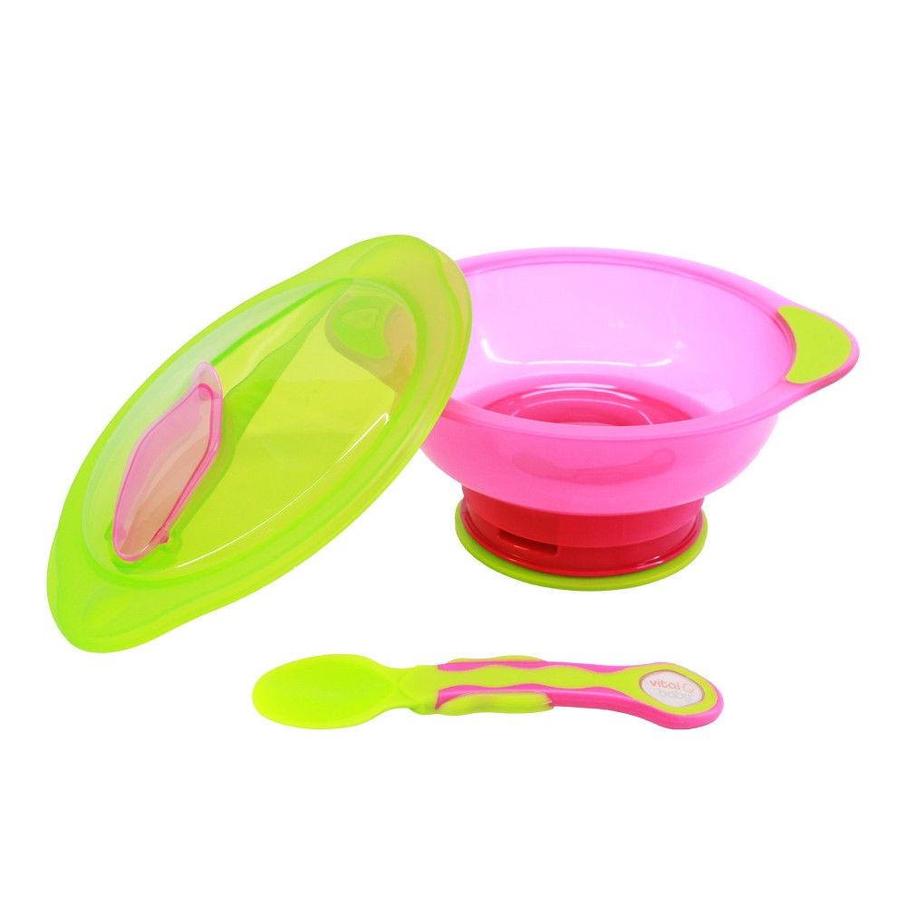Rosa und grüne Babyschüssel mit Deckel und Löffel. Schüssel mit Saugnapf, Deckel mit Löffelhalterung, Löffel.