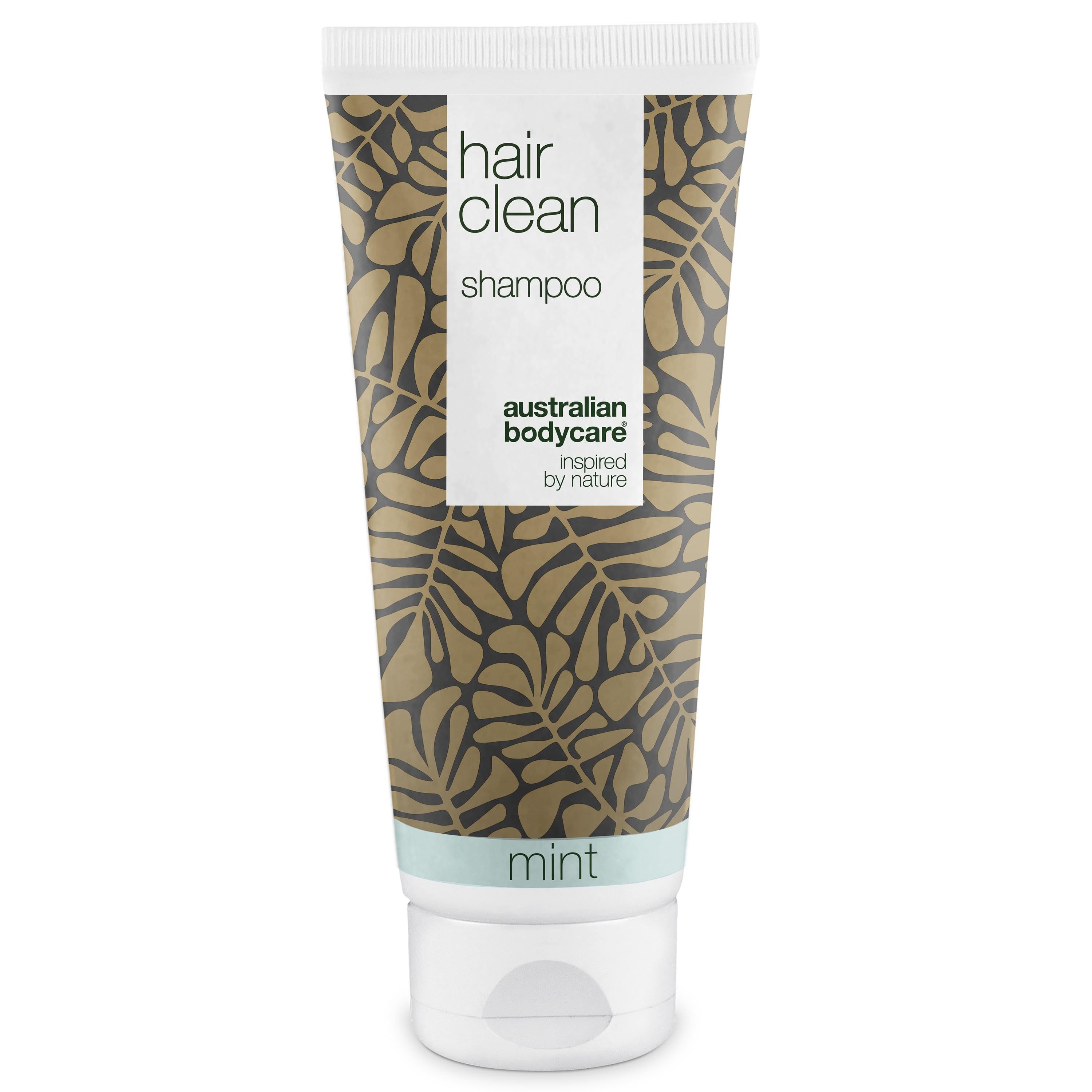 Tubo di shampoo con motivo a foglie. Scritta: Hair Clean Shampoo, Australian Bodycare, Mint.