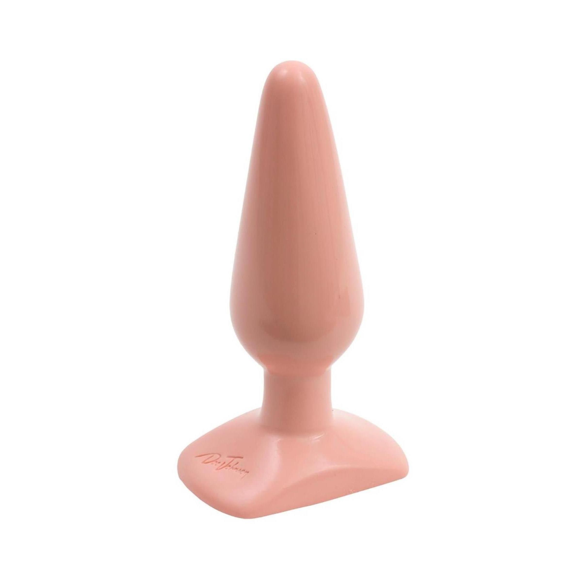Rosa Butt Plug. Konische Form, breite Basis. Marke Doc Johnson auf der Basis. Glatte Oberfläche.