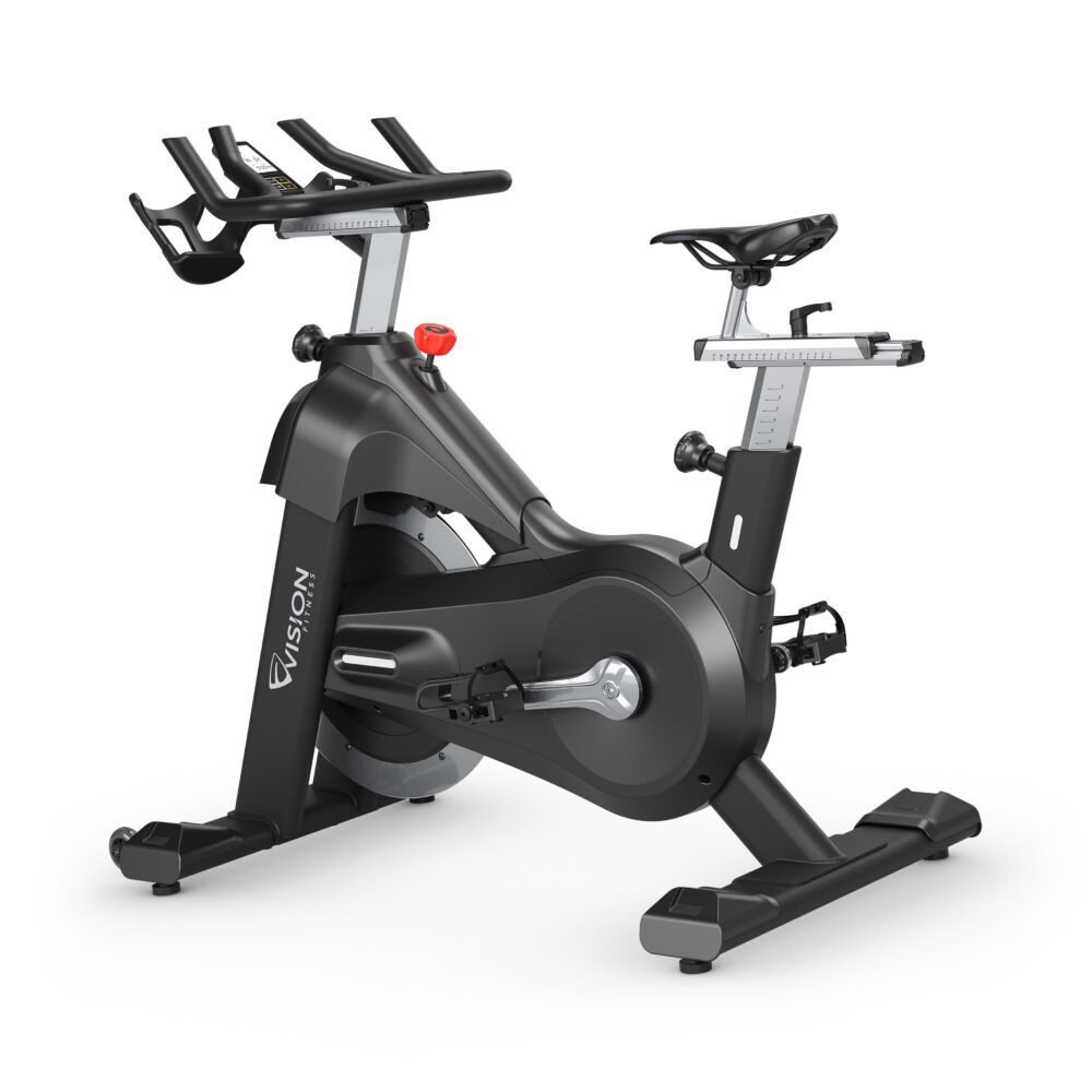 Schwarzes Indoor Cycle mit Konsole. Sichtbar: Lenker, Sattel, Pedale, Schwungrad, Vision-Logo.