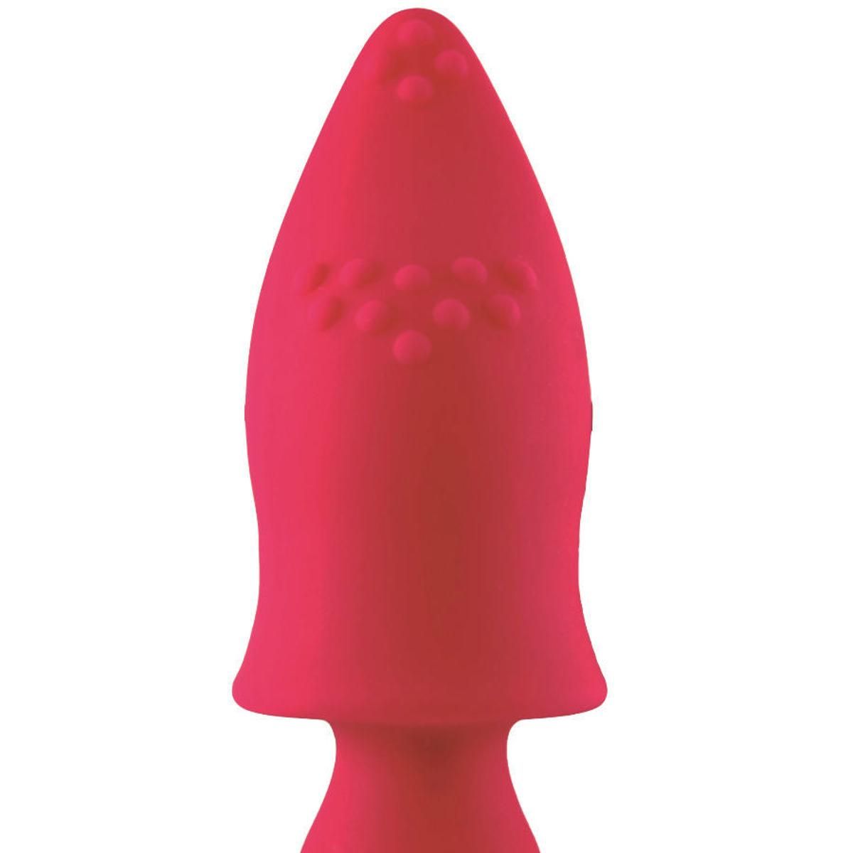 Nahaufnahme eines rosa Vibrators. Abgerundete Spitze mit erhabenen Punkten. Unterteil mit gebogener Form und Öffnung.