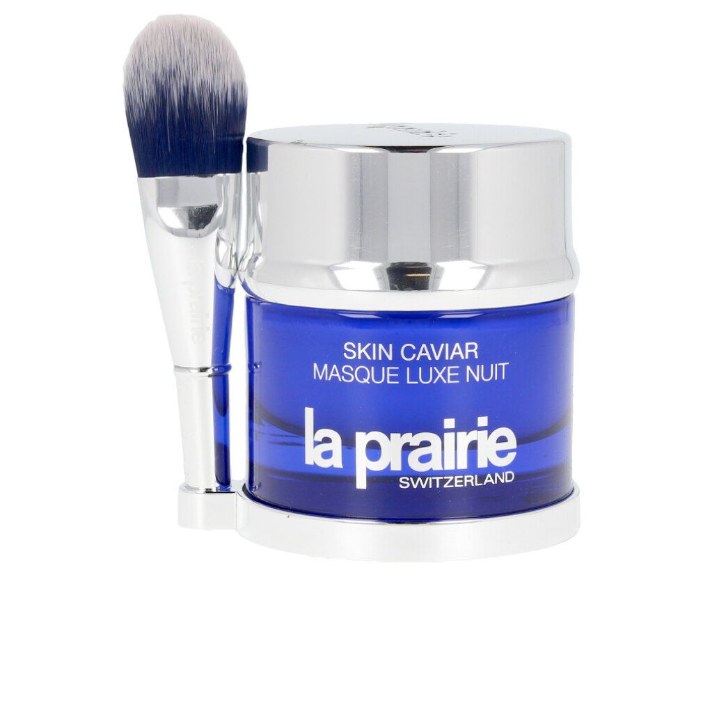 Blauer Tiegel mit silbernem Deckel und Pinsel. Aufschrift: Skin Caviar, La Prairie. Pinsel mit blauem Griff.