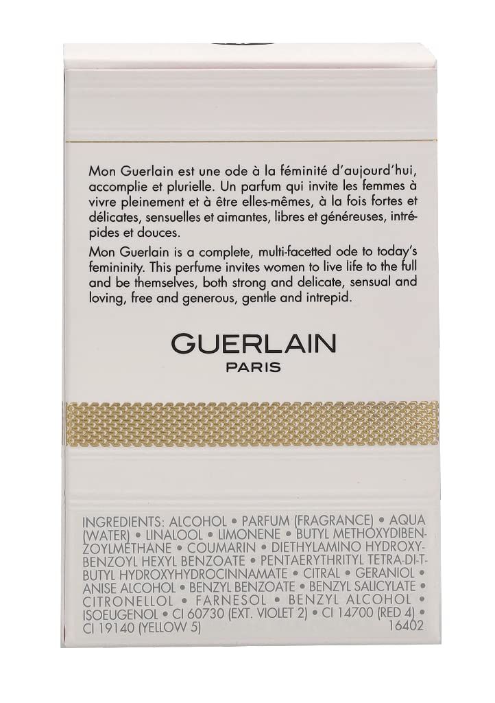 Weiße Verpackung mit Text und Inhaltsstoffen. Goldfarbener Streifen. Marke GUERLAIN.