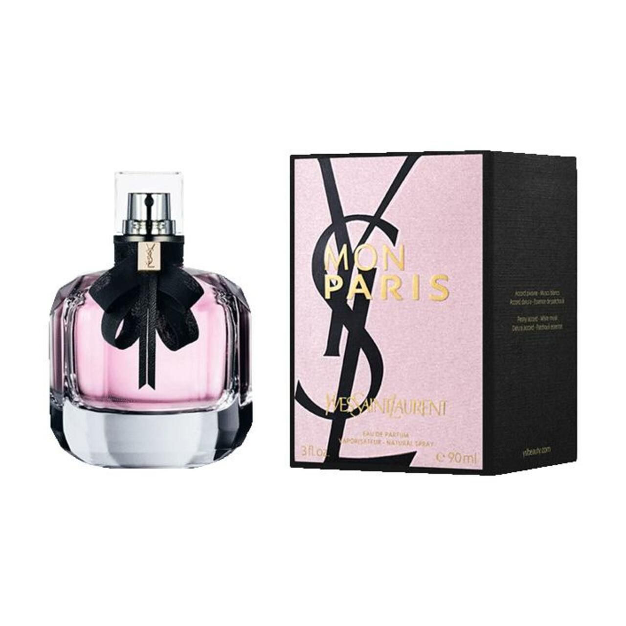 Flakon mit rosa Flüssigkeit, schwarzer Schleife und Karton. Aufschrift: Mon Paris, Yves Saint Laurent. 90ml.
