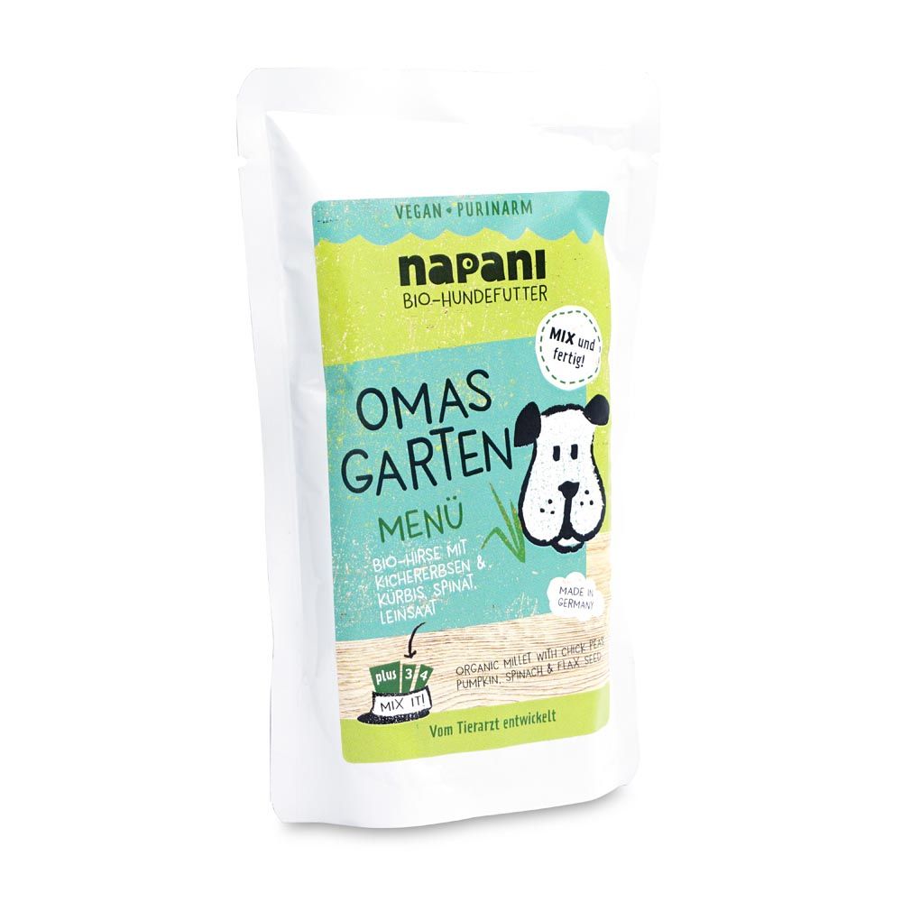 Weiße Verpackung mit Produktnamen und Illustration. Text: vegan, purinarm, Bio-Hundefutter, Omas Garten Menü.