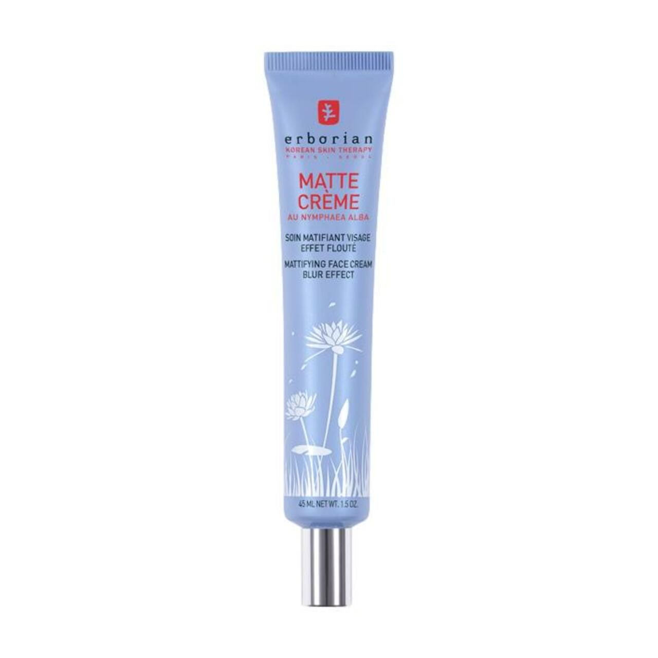 Blau-lila Tube mit silberner Kappe. Aufschrift: Matte Crème, Soin Matifiant Visage, Effet Flouté. Blumen-Illustrationen.