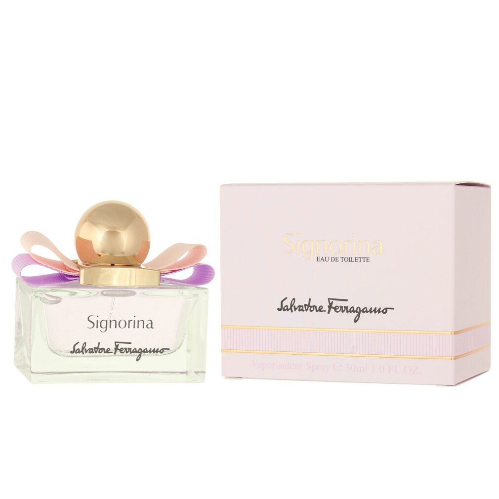 Signorina Eau de Toilette Flakon mit Verpackung. Rosa Flüssigkeit, goldener Verschluss, Schleife. Marke und Name sichtbar.