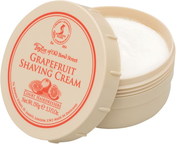 Beige Tiegel mit offenem Deckel. Aufschrift: Taylor of Old Bond Street, Grapefruit Shaving Cream. Roter Rand mit Logo.
