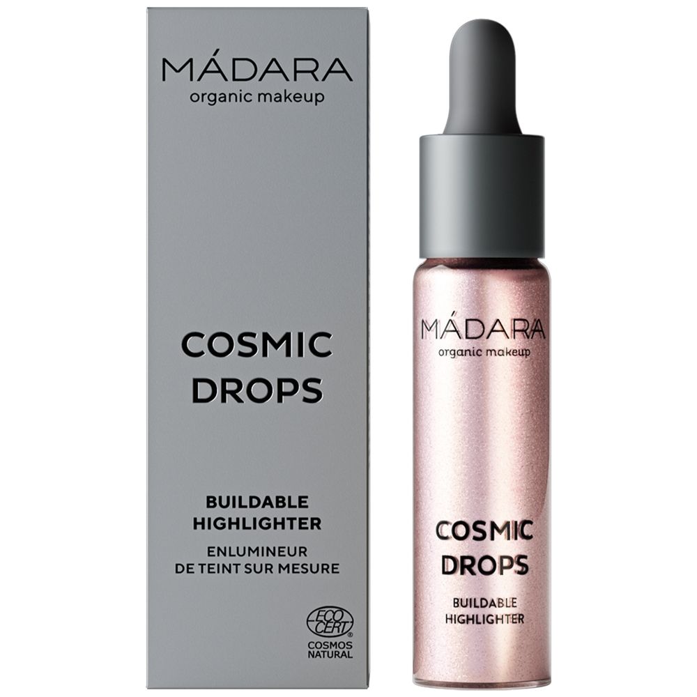 Kosmetisches Produkt mit Tropfapplikator und Verpackung. Text: Cosmic Drops, Buildable Highlighter, Madara.