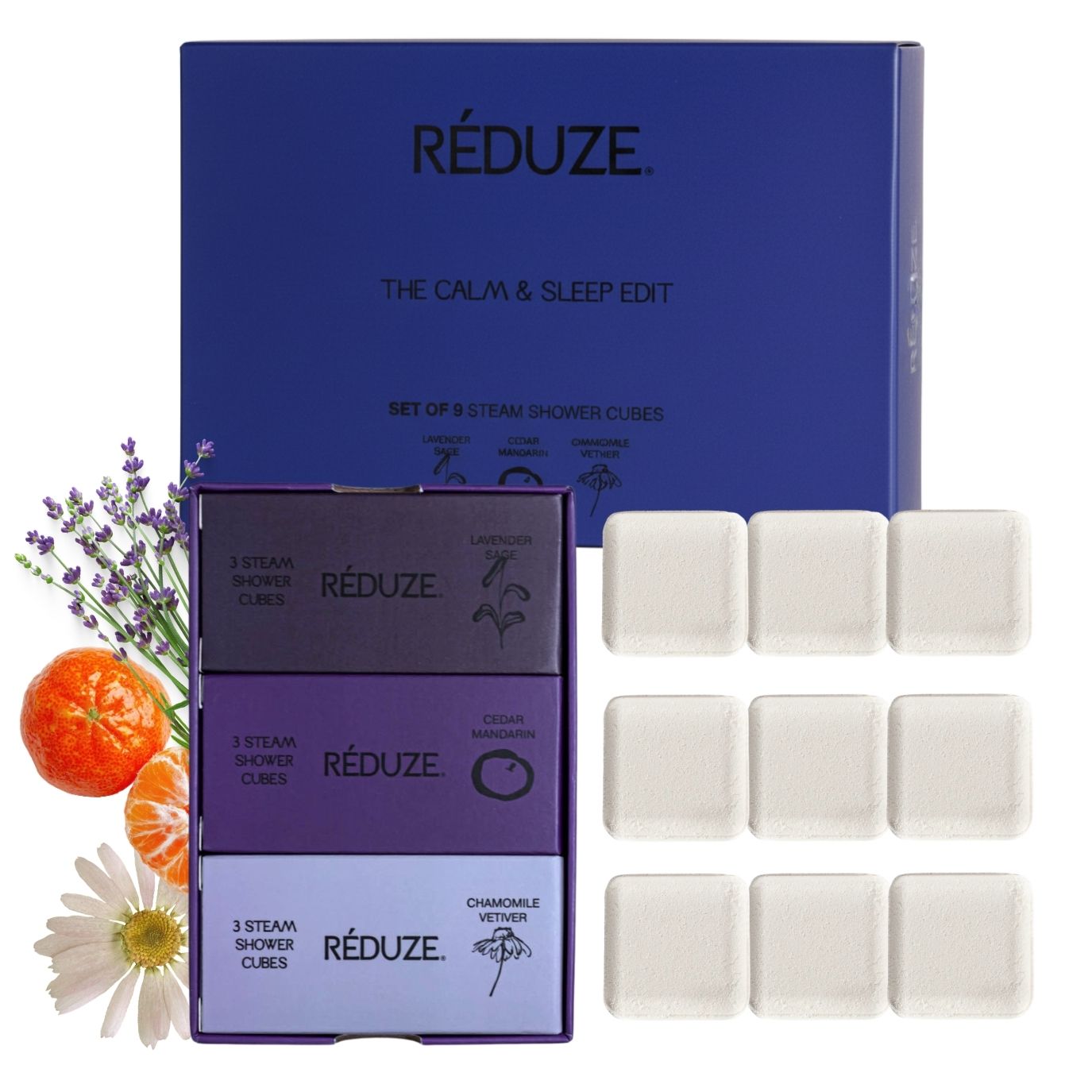 Blauer Karton mit RÉDUZE-Logo und 9 Duschwürfeln. Daneben: Lavendel, Mandarine, Kamille. The Calm & Sleep Edit.