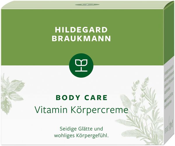 Verpackung von Hildegard Braukmann Body Care Vitamin Körpercreme. Grün-weiße Schachtel mit Produktnamen und Logo. Text: Seidige Glätte und wohliges Körpergefühl.