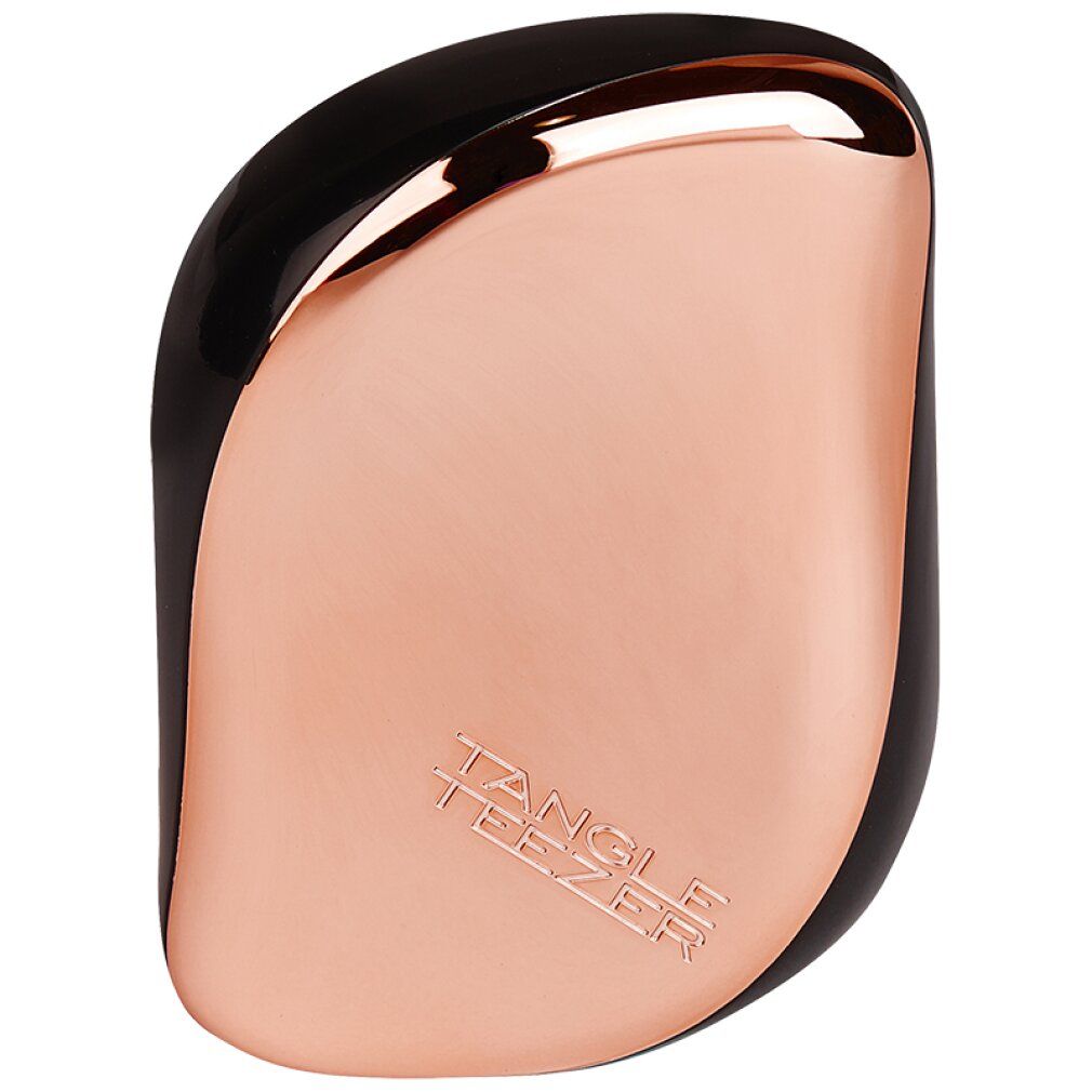 Kompakte Haarbürste, schwarz und kupferfarben. Geprägt: Tangle Teezer.