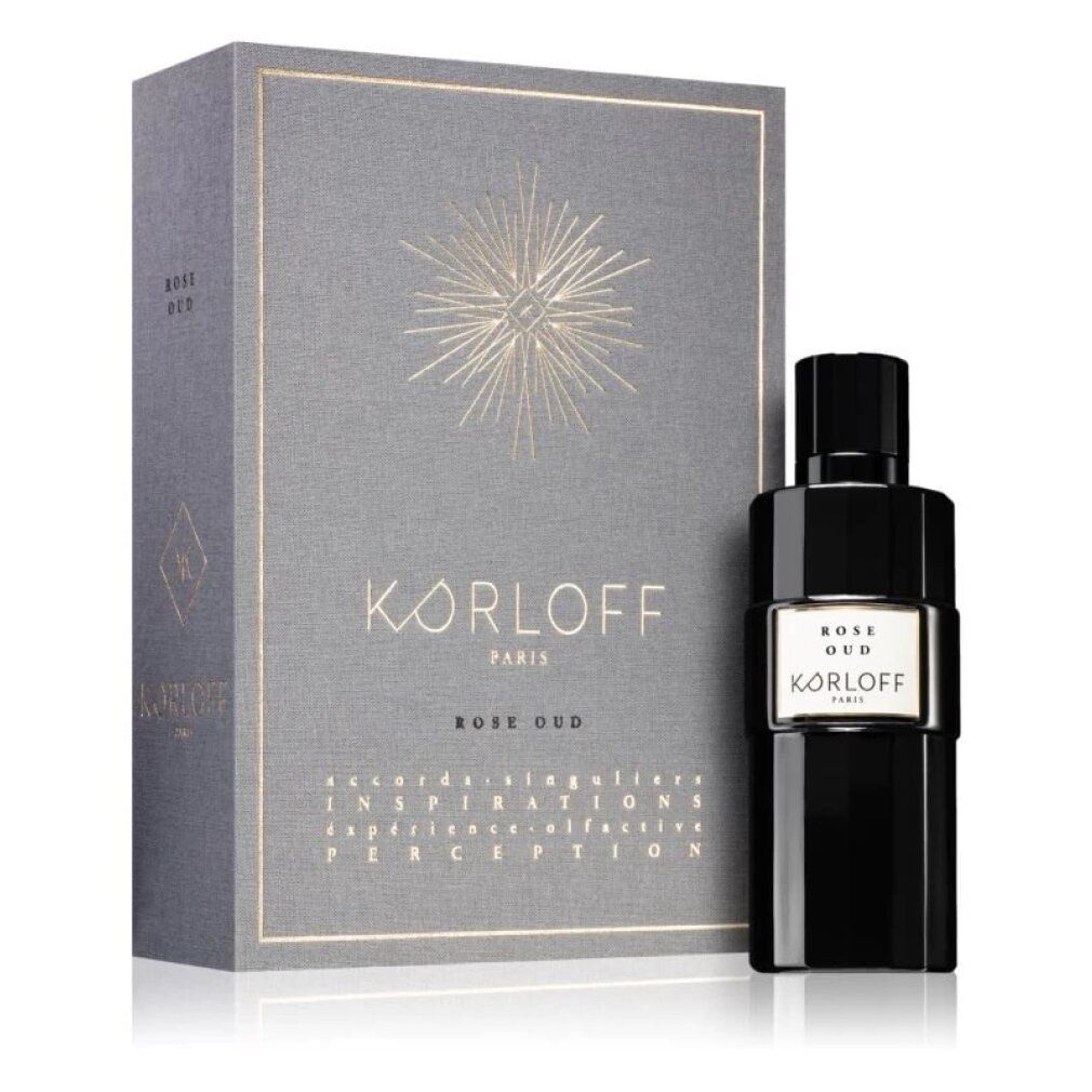 Graue Schachtel und schwarze Flasche. Aufschrift: KORLOFF, Rose Oud. Flasche mit weißem Etikett.