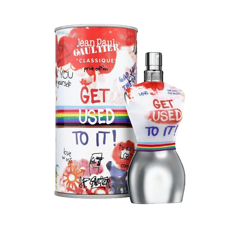 Parfumflakon in Torsoform und Dose. Dose mit Aufdruck "Jean Paul Gaultier". Flakon mit Regenbogenband. Text: "GET USED TO IT!"