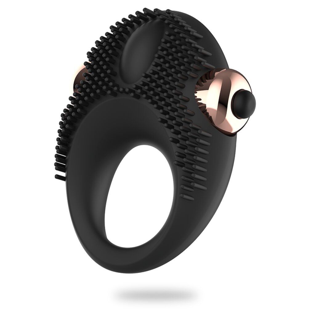 Schwarzer Penisring mit Reiznoppen und zwei rosegoldfarbenen Elementen. Ringförmig.