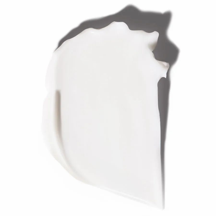Weißer Cremekleck auf weißem Hintergrund. Schattenwurf.