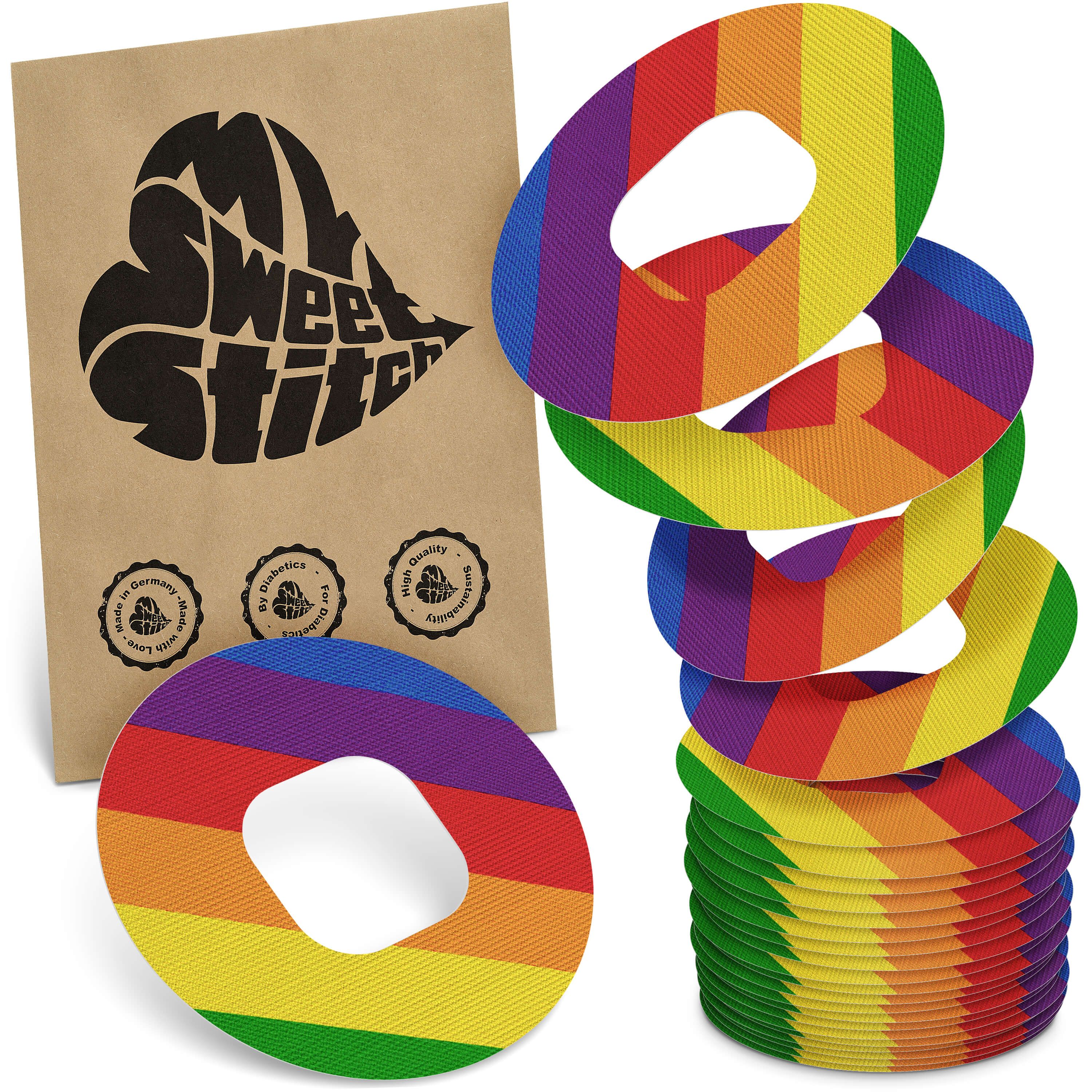 Mehrfarbige Ringpflaster mit Regenbogenmuster. Braune Verpackung mit Logo und Qualitätssiegeln. Stapel von Pflastern.