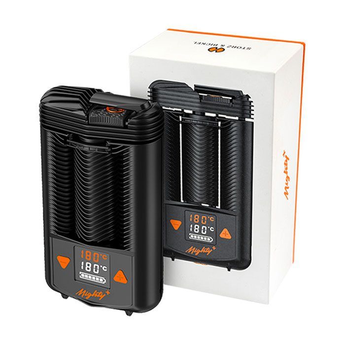 MIGHTY+ Vaporizer neben seiner Verpackung, beide mit digitaler Temperaturanzeige.