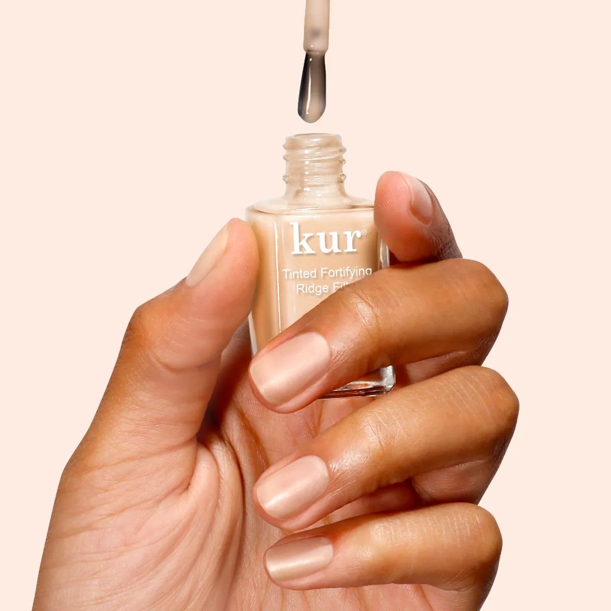 LONDONTOWN Kur Tinted Fortifying Ridge Filler Glättender getönter Nagellack Apricot Beige