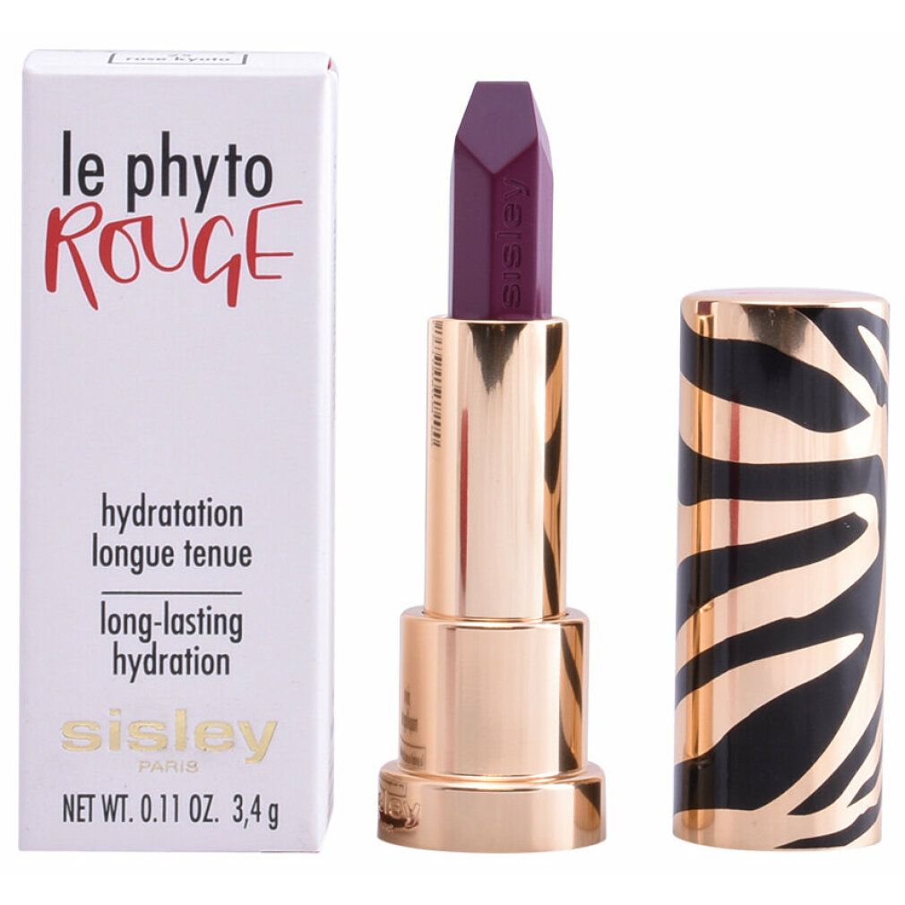 Le Phyto Rouge Lippenstift mit Verpackung. Goldener Lippenstift mit Zebrastreifen-Muster. Verpackung mit Produktinformationen.
