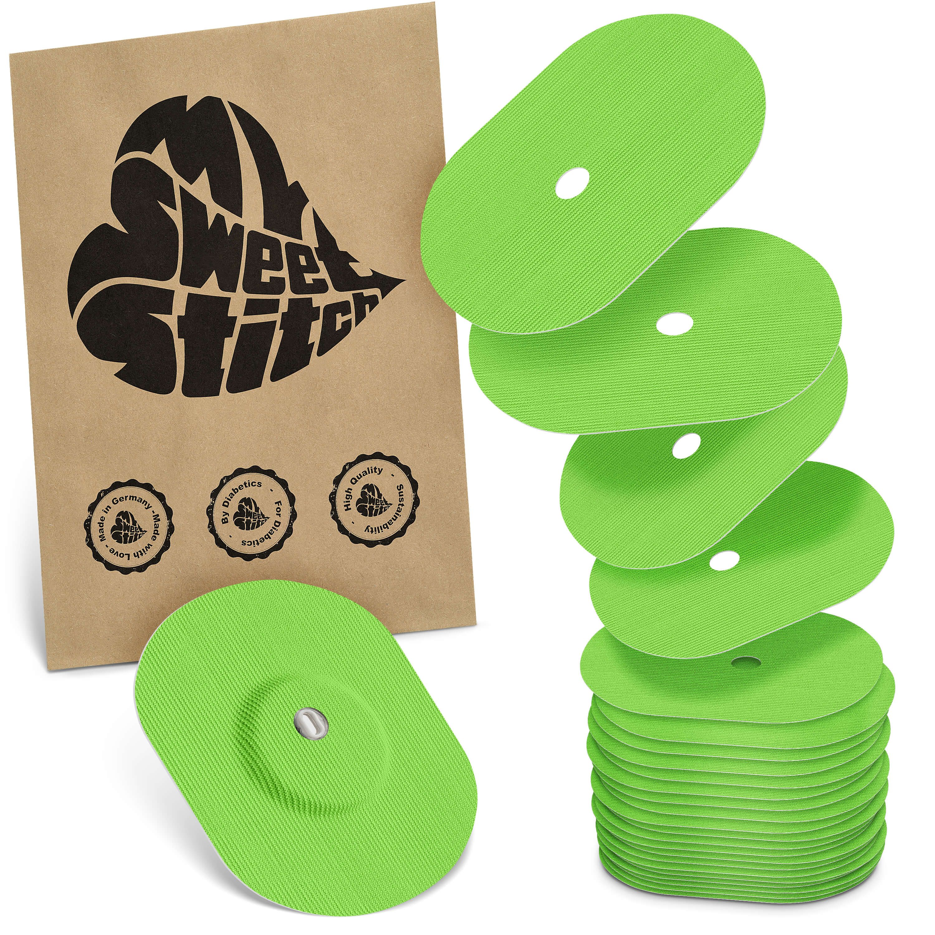 Grüne, ovale Pflaster mit Loch und geriffelter Oberfläche. Braune Verpackung mit Logo und Siegeln. Stapel von Pflastern.