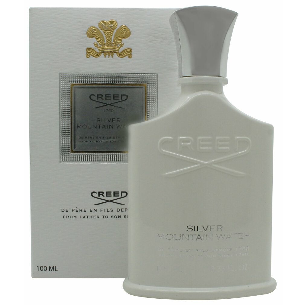 Weiße Parfumflasche und Verpackung. Aufschrift: Creed Silver Mountain Water. Flasche mit silbernem Verschluss.