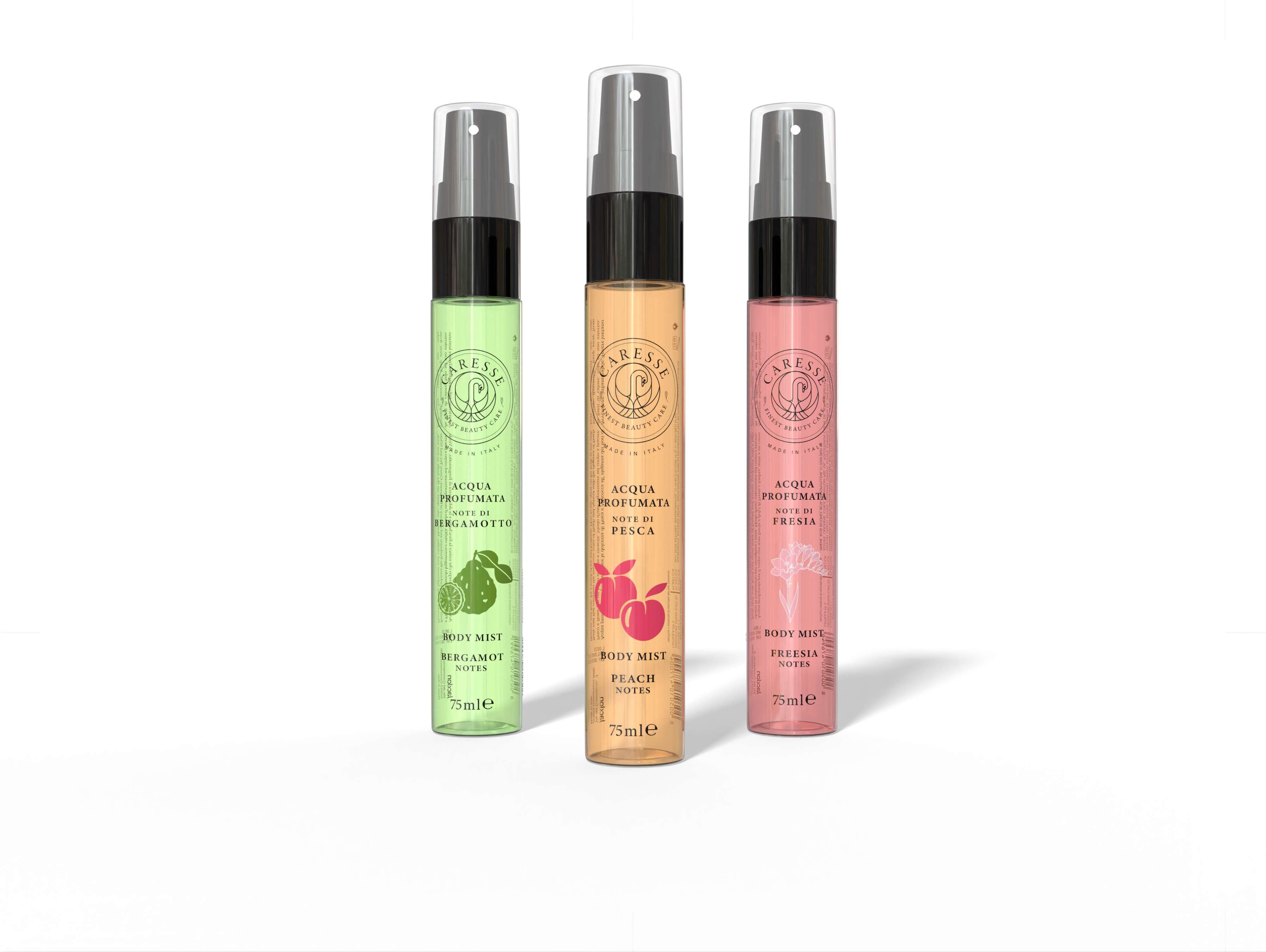 Drei Körpersprays, Freesie, in verschiedenen Farben. Mit Sprühkopf und Produktnamen. 75ml Flaschen.