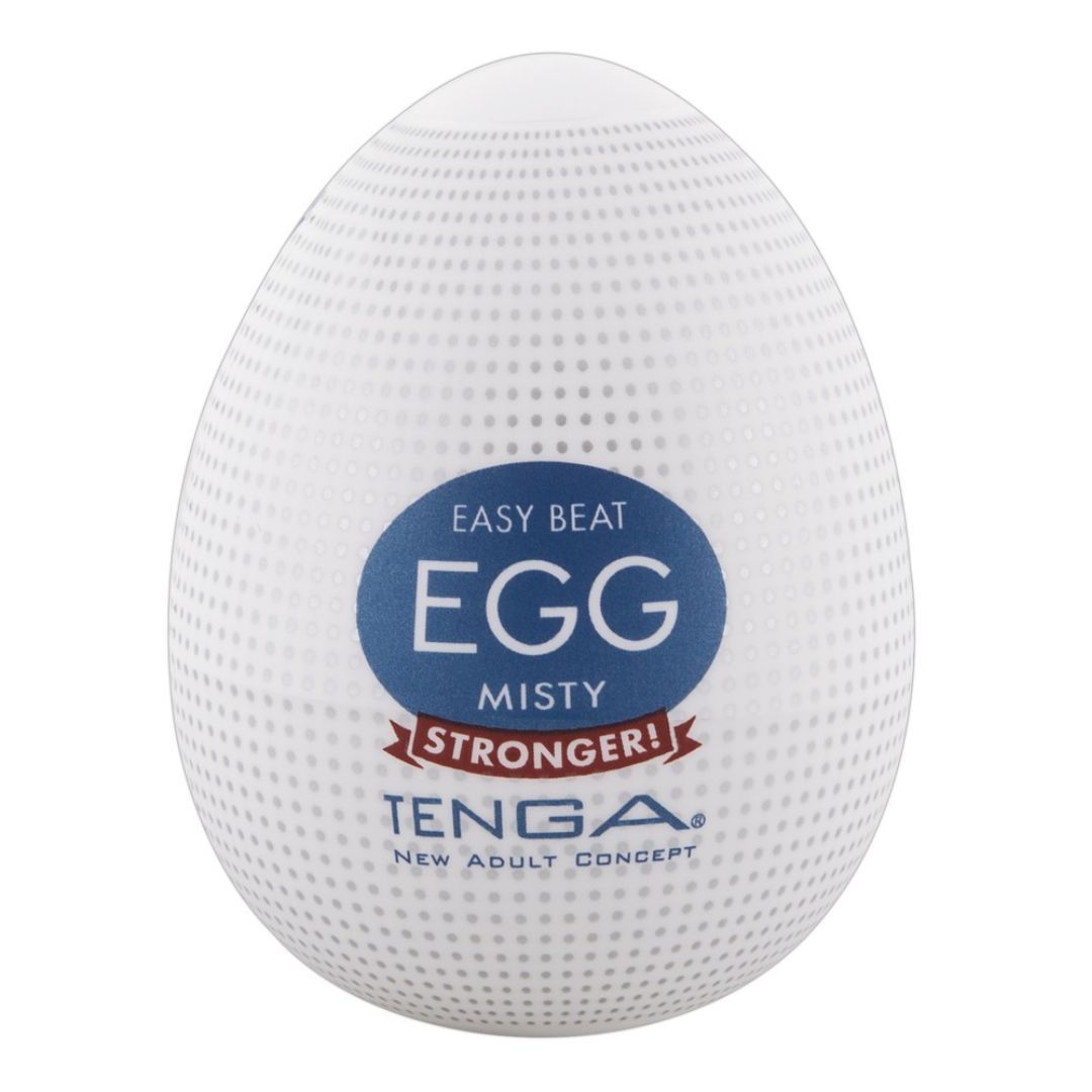 Weißes, eiförmiges Produkt mit gepunkteter Oberfläche. Aufschrift "EGG MISTY" und "TENGA".