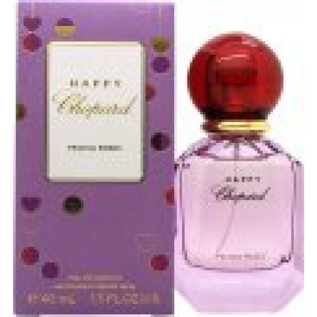 Rosa Flakon mit rotem Verschluss und lila Verpackung. Aufschrift Happy Chopard Felicia Roses. 40 ml, 1.3 FL.OZ.U.S.