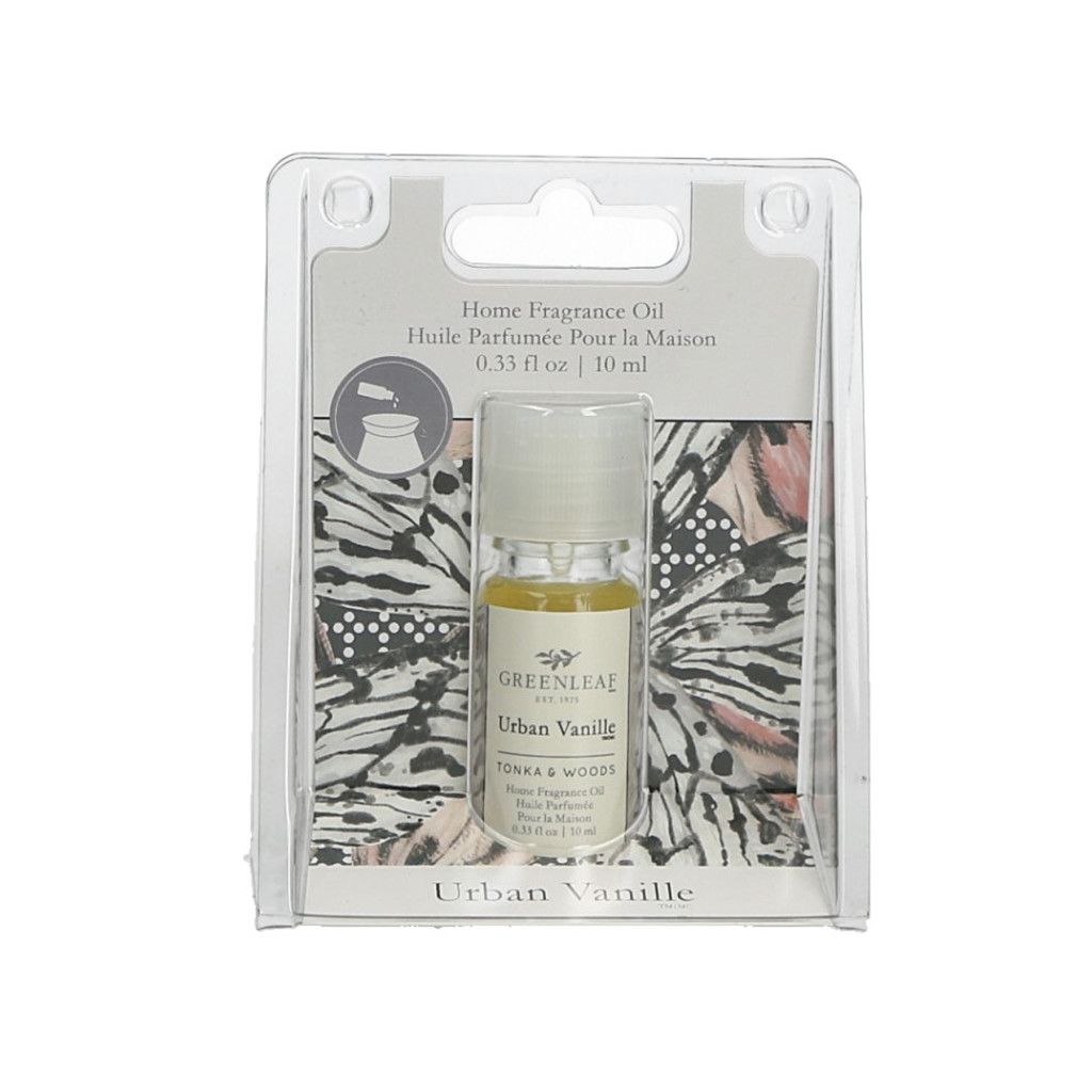 Duftöl-Essenz in einer kleinen Glasflasche mit weißem Deckel, in einer transparenten Kunststoffverpackung. Aufschrift: Greenleaf Urban Vanille.